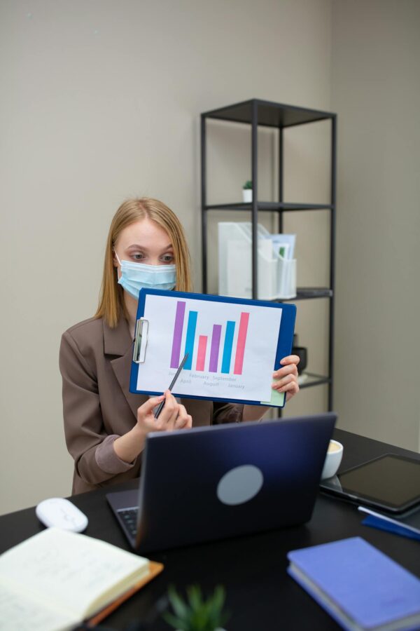 A Woman Doing a Presentation while in a Video Call